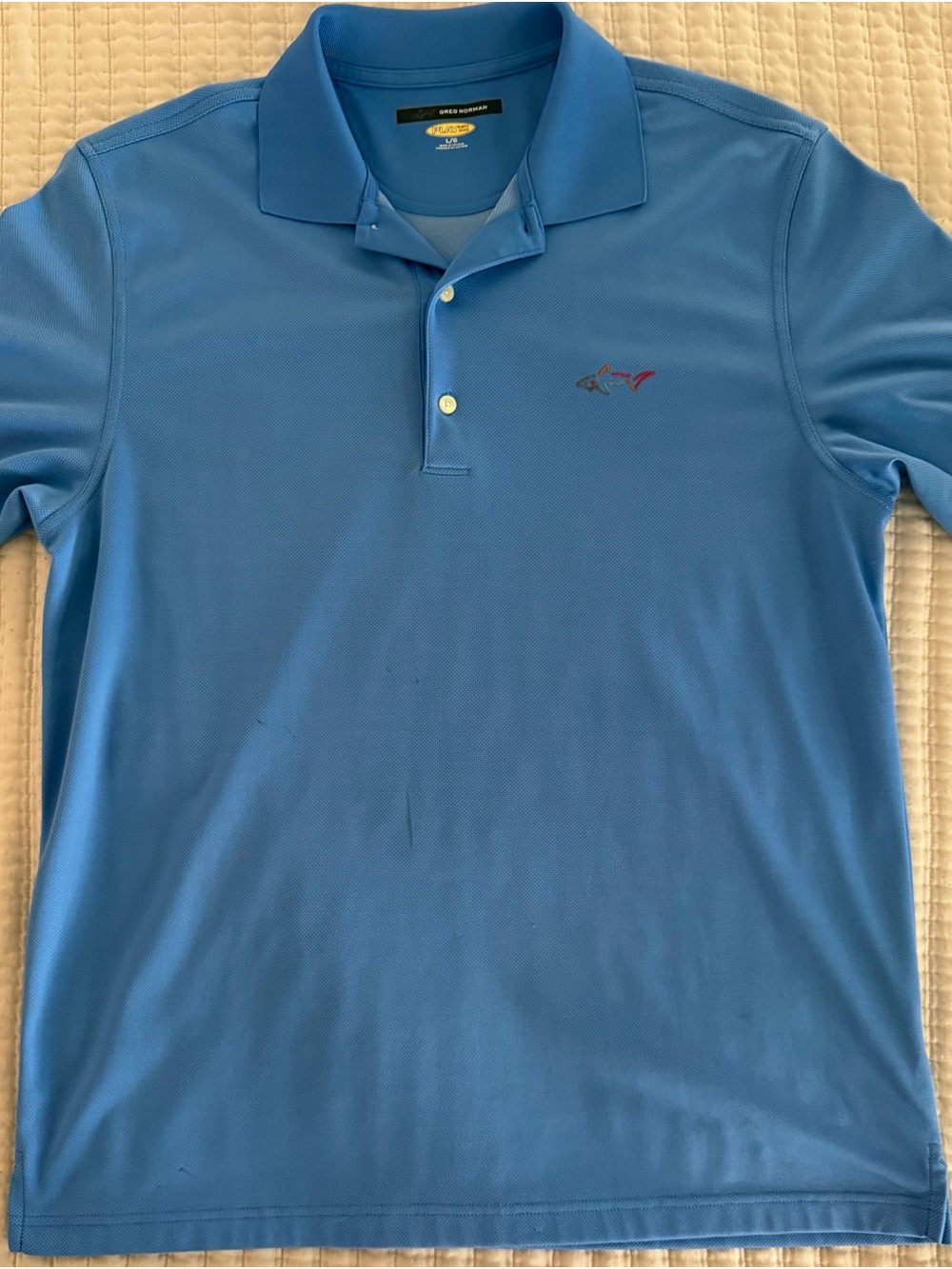 Men’s large light blue Greg Norman golf polo